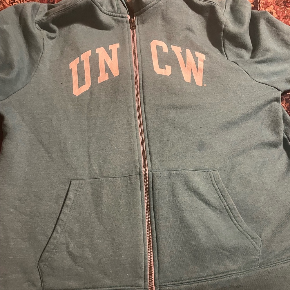 UNCW Women’s Zip up hoodie XL. So cute. Small stain on front